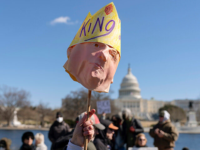 People take part in the "No Kings Day" protest on Presidents Day in Washington, in support