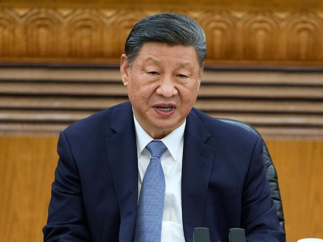 Chinese President Xi Jinping attends an event with international business representatives