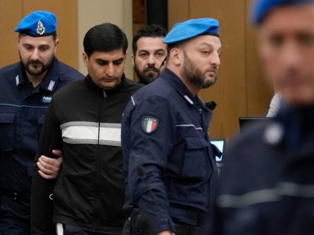 FILE - Nomanoulaq Nomanoulaq arrives at a hearing of the trial for the alleged murder of h