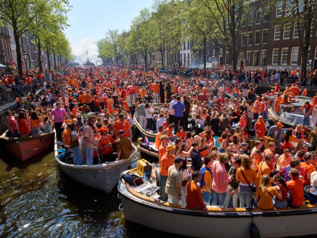 Herengrscht canal was jam-packed with boats as people celebrated King's Day in Amsterdam,