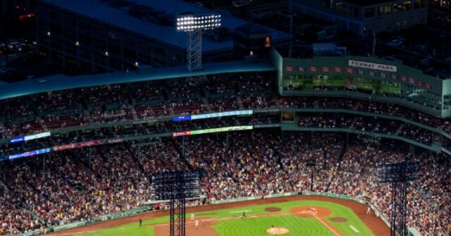 WATCH: Red Sox Fan Catches Foul Ball with His Food