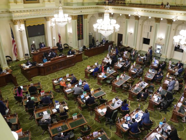 FILE - Members of the California state Assembly meet at the Capitol in Sacramento, Calif.,