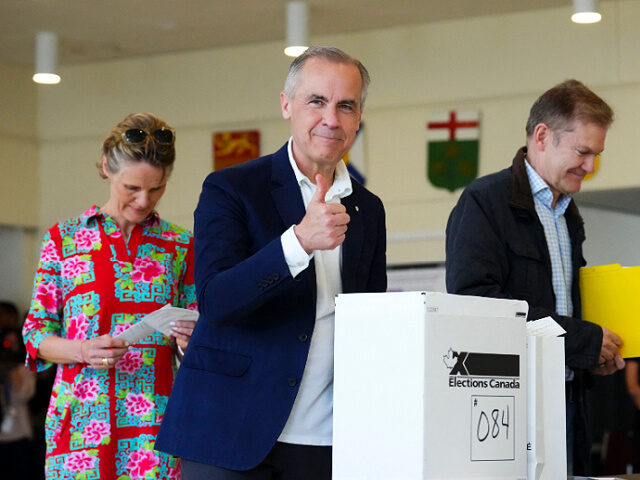 Canadian Prime Minister and Liberal leader Mark Carney, alongside his wife Diana Fox Carne