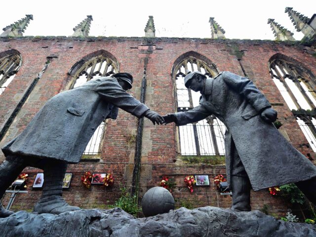 A resin model of a sculpture illustrating the WW1 Christmas Truce football match is pictur