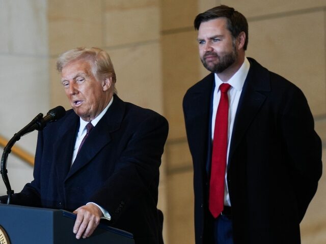 Donald Trump and JD Vance on the podium