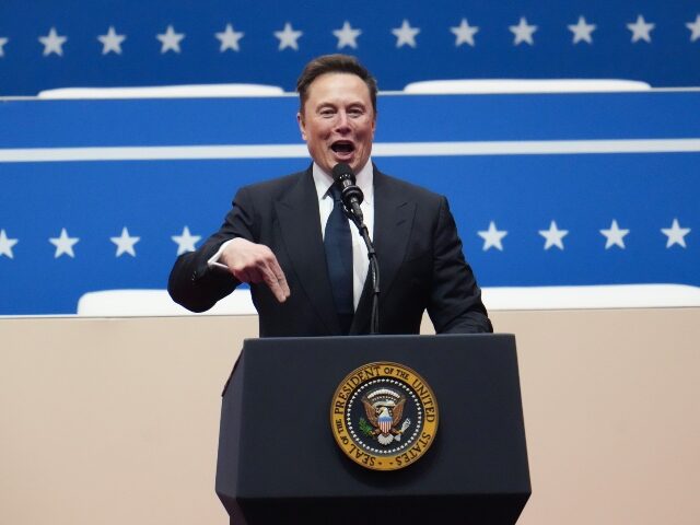 Elon Musk at the podium
