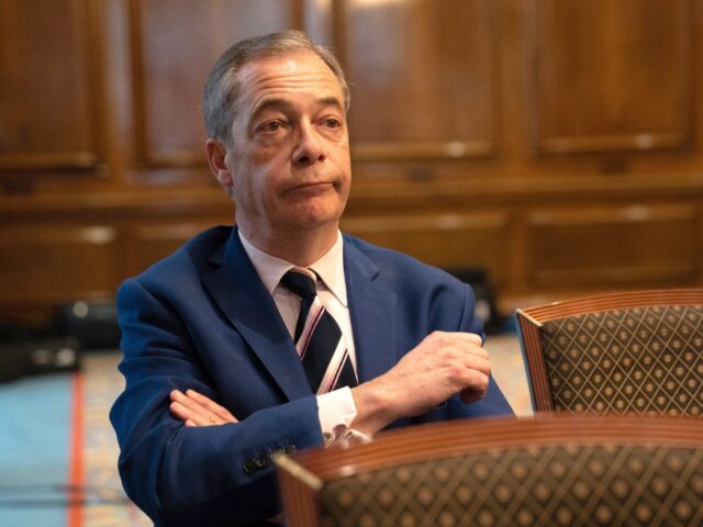 LONDON, ENGLAND - MARCH 20: Reform UK honorary president Nigel Farage listens during a par