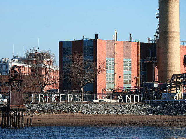 A sign marks the location of the Rikers Correctional Center in the East River on March 9,