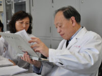 This undated file photo shows Weng Xinhua R, lifetime professor of the Infectious Disease