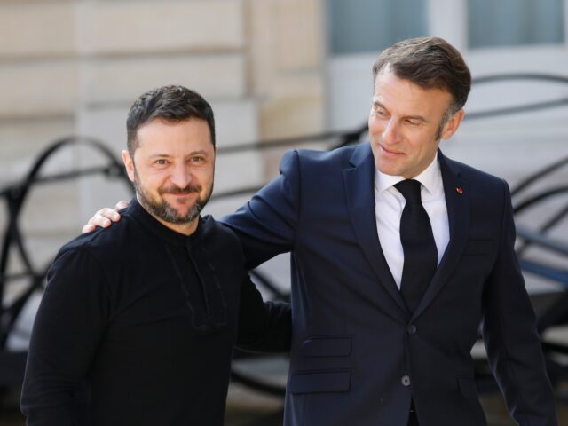 PARIS, FRANCE - MARCH 27: President of Ukraine Volodymyr Zelensky is greeted by French Pre