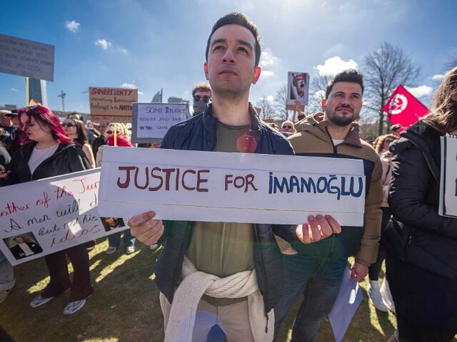 THE HAGUE, NETHERLANDS - 2025/03/29: Supporters of Mayor Ekrem Imamoglu of Turkey hold pla