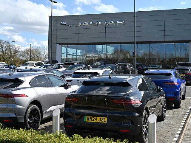 BRISTOL, ENGLAND - MARCH 28: New and used cars are parked at the Jaguar, Land Rover dealer