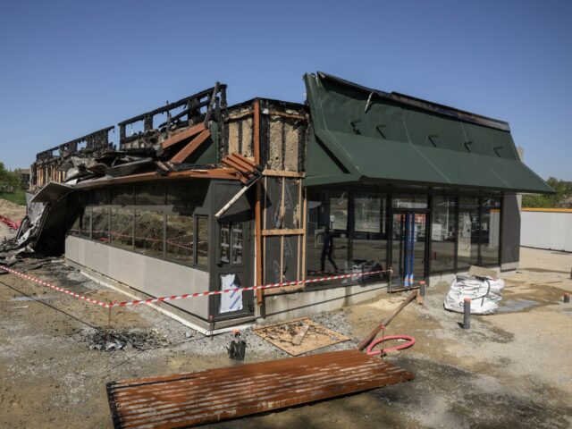 A general view shows an under-construction McDonald's restaurant damaged by fire, in Montr
