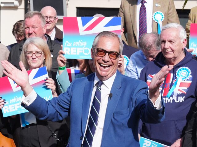 Reform UK leader Nigel Farage poses outside The Waterford Lodge, Morpeth, in Northumberlan
