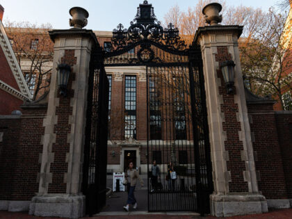 CAMBRIDGE, MASSACHUSETTS - APRIL 17: People leave Harvard University on April 17, 2025 in