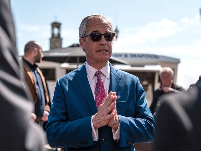 Nigel Farage Hosts Reform Party Press Conference RAMSGATE, ENGLAND - APRIL 24: Reform UK leader, Nigel Farage, talks to members of his team