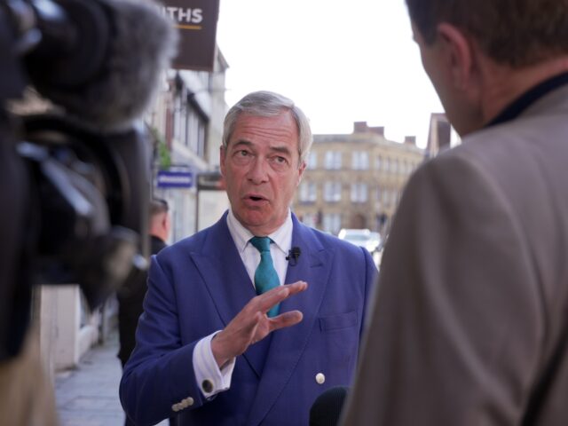 Reform UK leader Nigel Farage speaking to the media in Salisbury, whilst campaigning for t