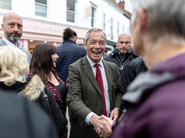 BERVERLEY, ENGLAND - APRIL 25: Leader of the Reform Party Nigel Farage meets and speaks wi