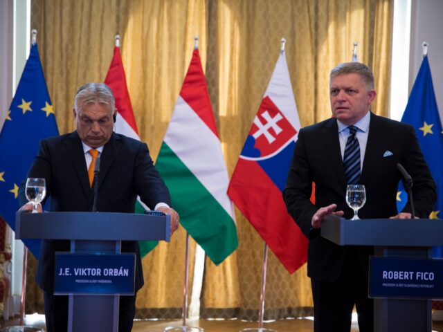 BRATISLAVA, SLOVAKIA - APRIL 28: Slovakian PM Robert Fico (R) and Hungarian PM Viktor Orba