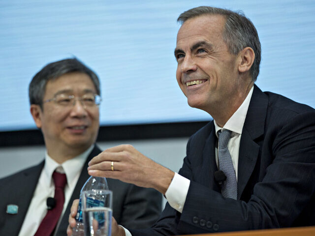Mark Carney, governor of the Bank of England, right, and Yi Gang, deputy governor of the P