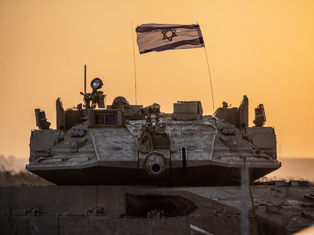 Israeli tanks move near Gaza border as Israeli army deploys military vehicles around the G