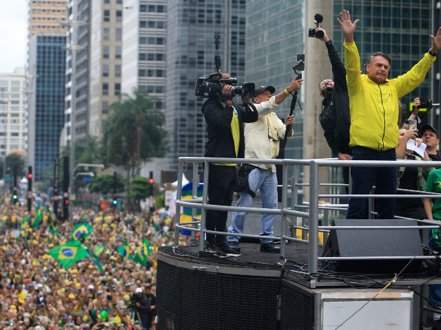 Brazil's former President Jair Bolsonaro waves to supporters during a rally at Paulis