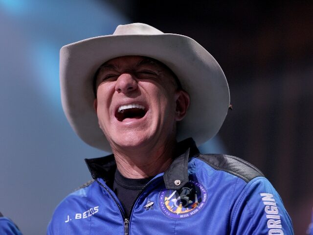 Jeff Bezos laughing