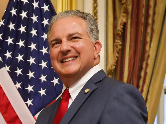 U.S. Speaker of the House Rep. Mike Johnson (R-LA) (L) participates in a ceremonial sweari