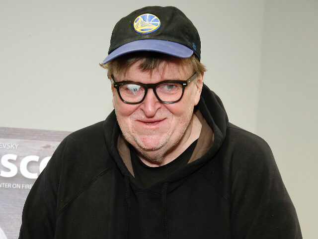 MichaelMoore NEW YORK, NEW YORK - NOVEMBER 15: Michael Moore poses during the "Francesco" New