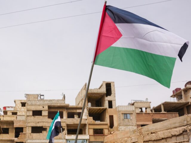Palestinian flag Activists in Yarmouk Camp, in the Syrian capital of Damascus, organized a solidarity vigil
