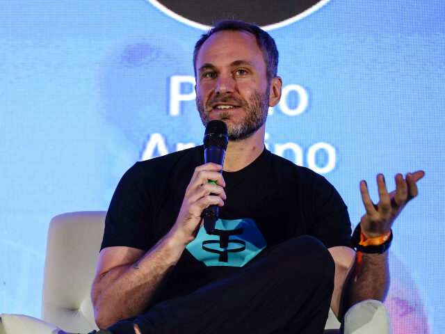 Paolo Ardoino Paolo Ardoino, chief executive officer of Tether Holdings Ltd., during the Plan B Forum in