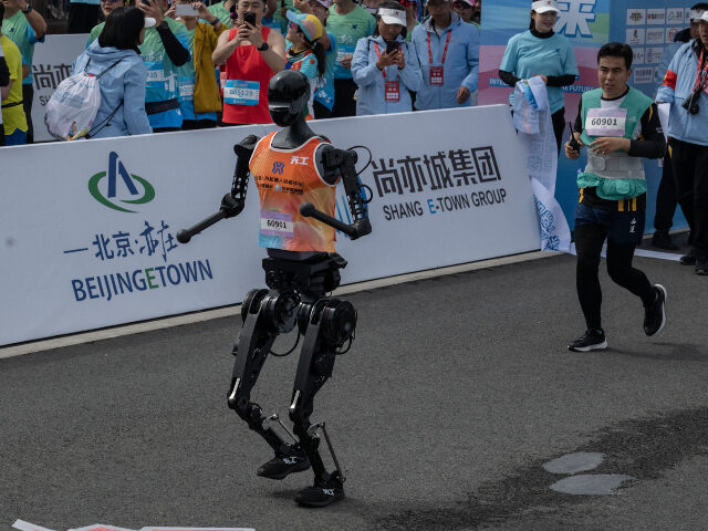 Robot in half marathon in China BEIJING, CHINA - APRIL 19: A Humanoid robot called Tiangong runs after the finish line in