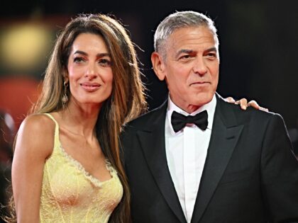 Actor George Clooney and his wife Amal Clooney attend the red carpet of the movie "Wolfs"