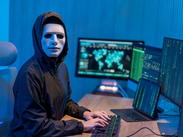 Masked Anonymous Hacker Organizes malware Attack on Global Scale.