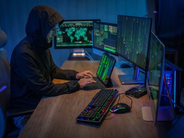 hacker at his desk