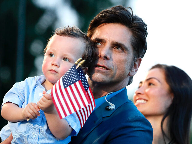 WASHINGTON, DC - JULY 03: Actor and host John Stamos (C) with his son Billy Stamos and wif