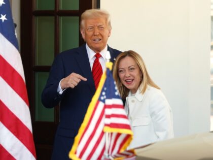President Donald Trump, left, greets Italy's Prime Minister Giorgia Meloni upon her a
