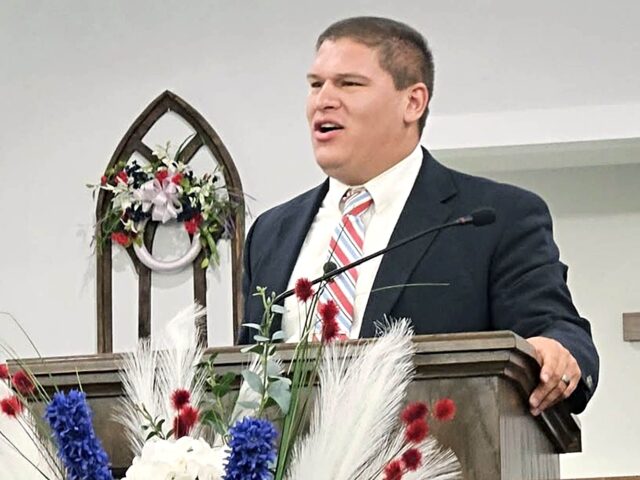 Pastor Josh Sullivan speaks during a service