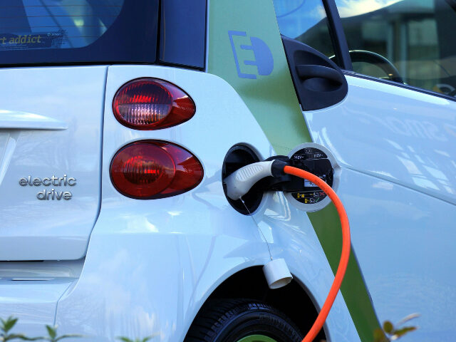 white and orange nozzle - electric vehicle