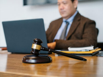 lawyer judge working on laptop