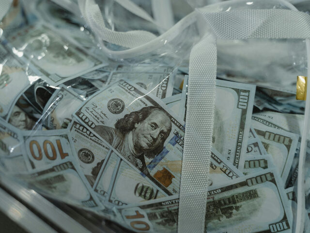US dollar bills in clear plastic bag