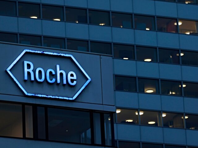 roche america Signage for Roche Holding AG on a building in the company's headquarters campus in Basel,
