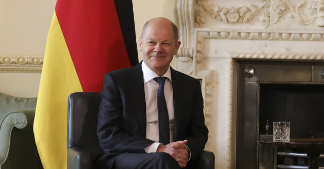 Man Who Snuck Into VIP Convoy And Hugged German Chancellor Fined