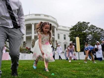 Children participate in the Easter Egg Roll on the South Lawn of the White House Monday, A
