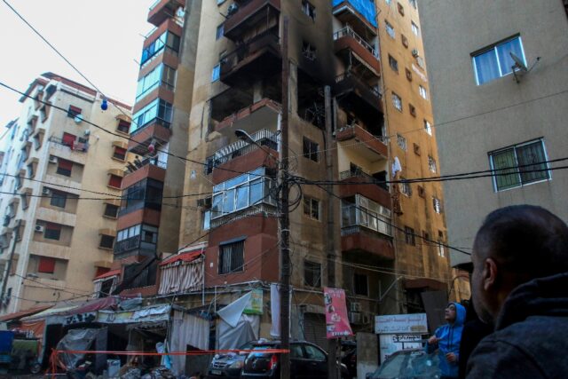 An Israeli air strike targeting a Hamas commander caused heavy damage to an apartment bloc