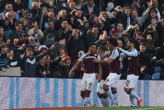 Aston Villa's Ollie Watkins (L) celebrates after scoring against Newcastle