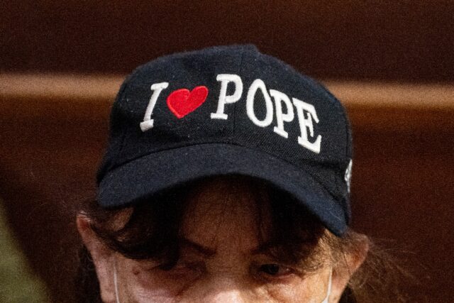 Catholics and tourists flocked into the imposing Gothic Cathedral that opened its doors in