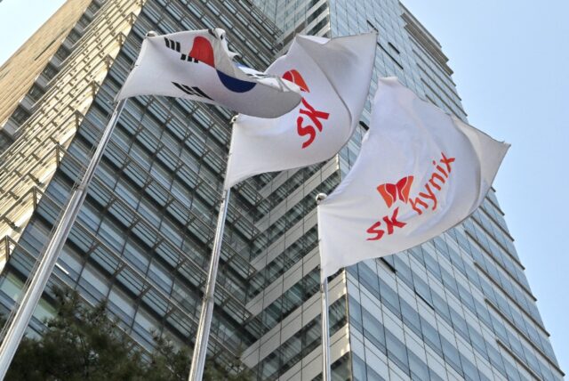 Company and national flags fly outside the SK hynix Bundang office in Seongnam