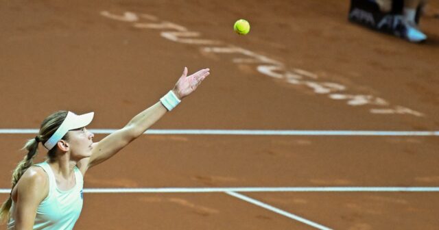 Ekaterina Alexandrova preparing to serve as she beat Mirra Andreeva in Stuttgart