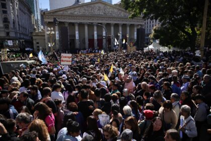 Faithful attend a mass to bid farewell to Pope Francis in front of the Buenos Aires Cathed